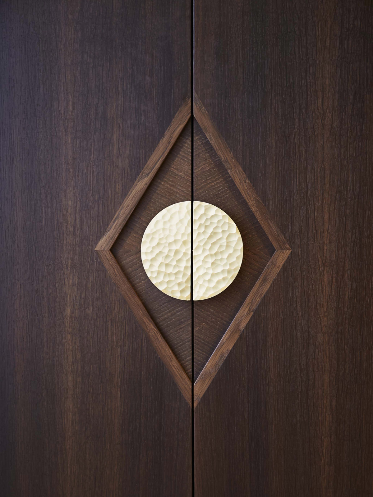 Fumed oak doors, marquetry detail around Ged Kennet Handle, solid wood diamond pattern.