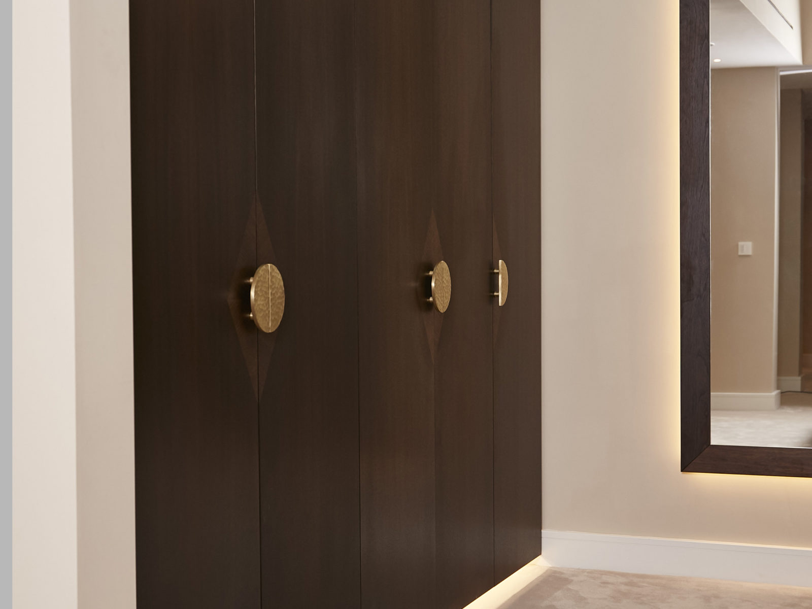 Fumed oak dressing room doors with bespoke handle