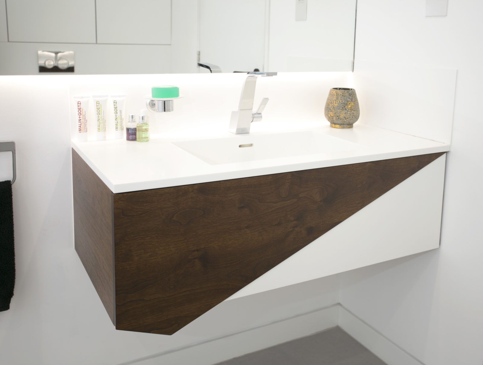 Walnut and Corian vanity unit