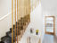 staircase with lighted recessed handrail and oak battens balustrade