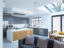 Open plan kitchen with matt grey lacquered doors, Antartica Corian worktop and splashback, solid oak island doors