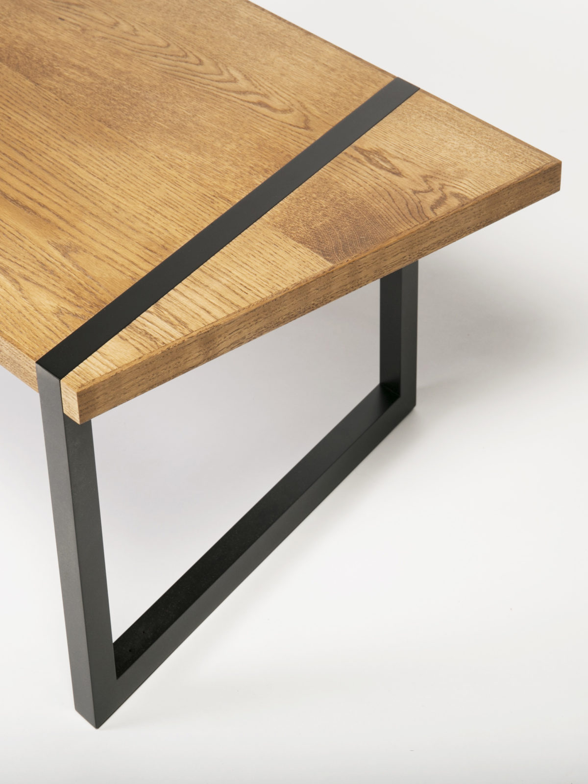Oak coffee table with built-in angled leg