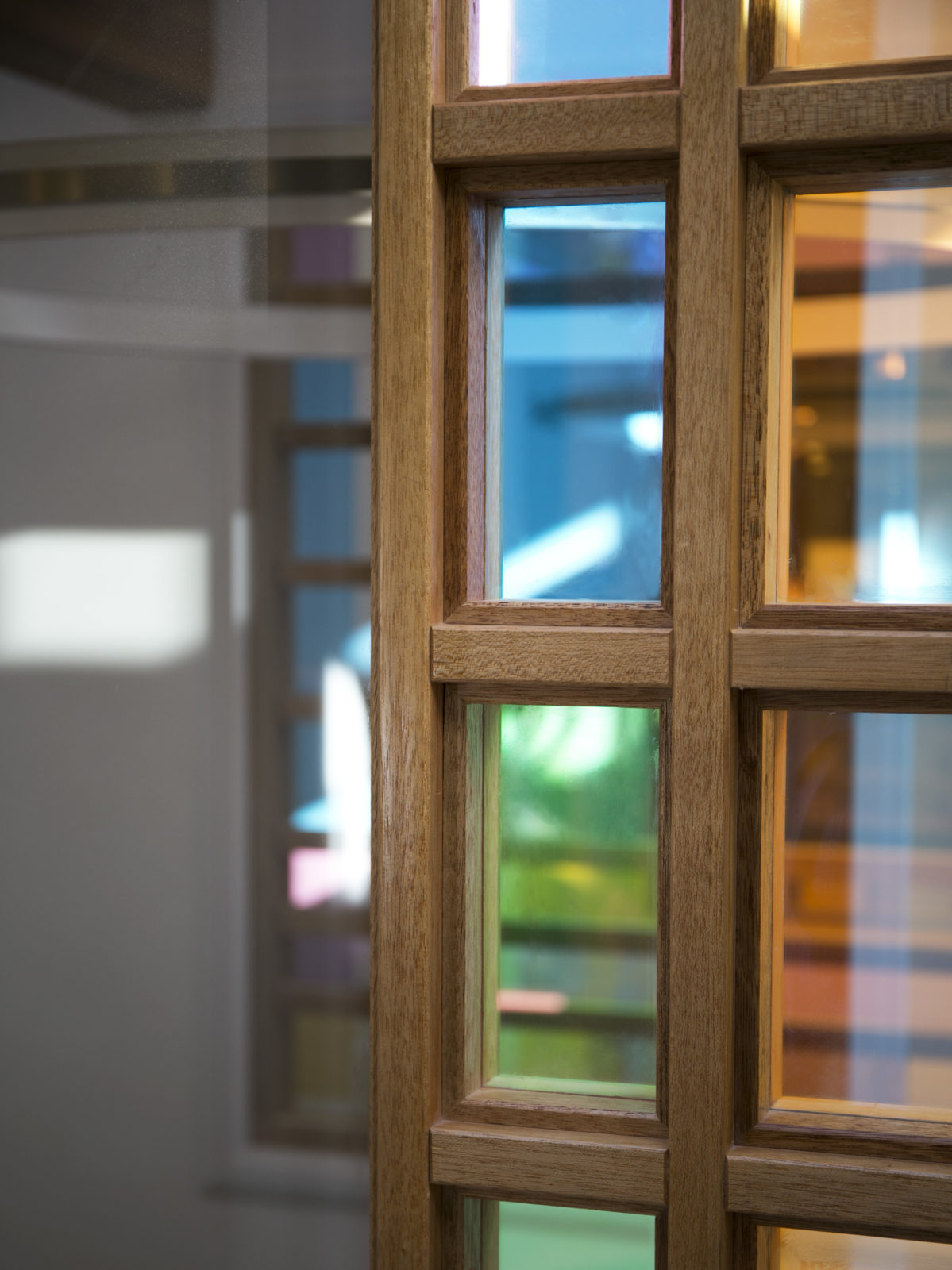 Meranti window frame with dichroic glass