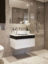 Moleanos limestone bathroom with white Corian and fumed oak vanity unit