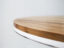 Teak, corian and steel dining table top detail
