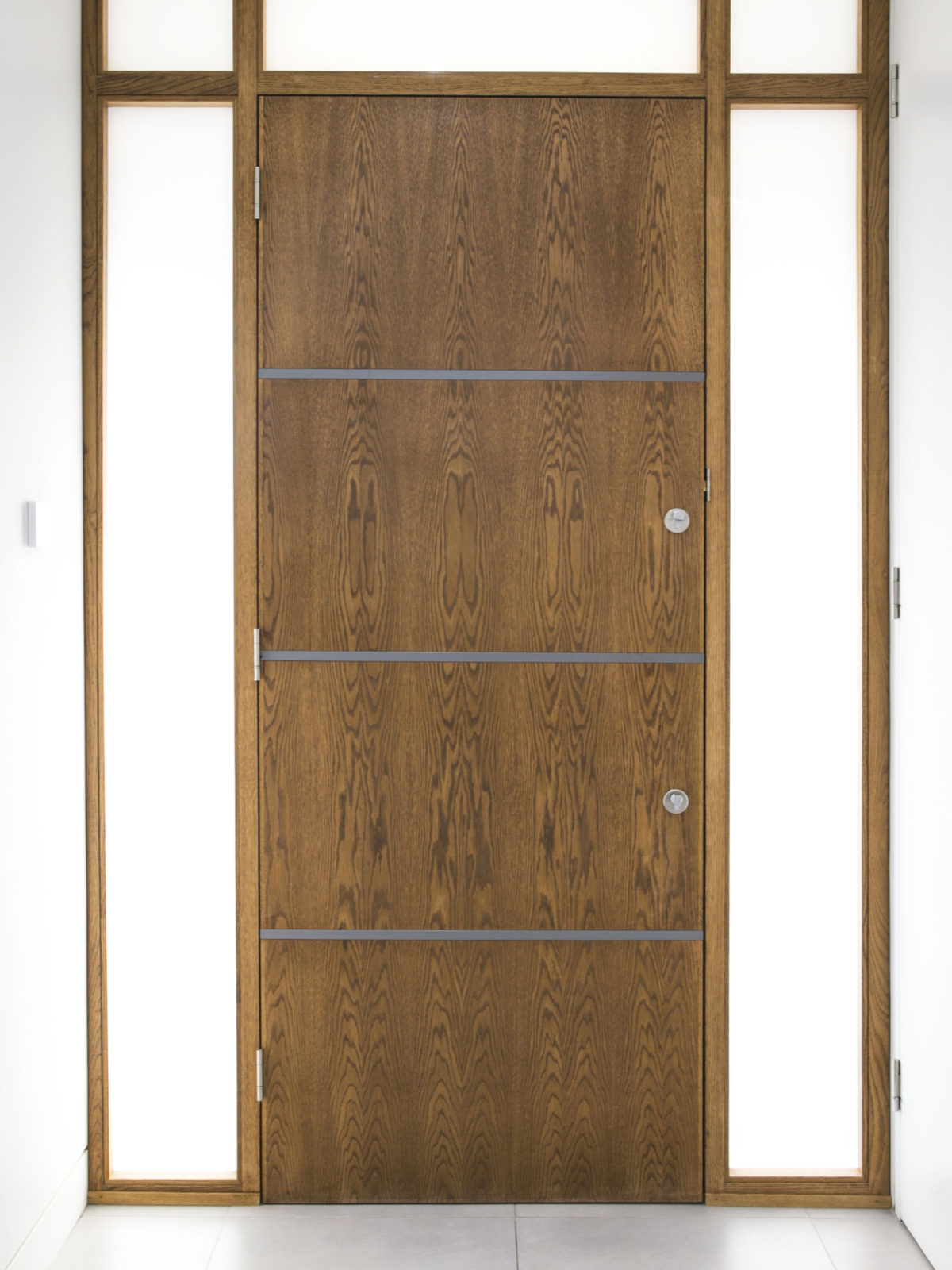 bespoke solid oak door with matt lacquered inlays