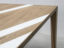 Oak dining table with white Corian inlays