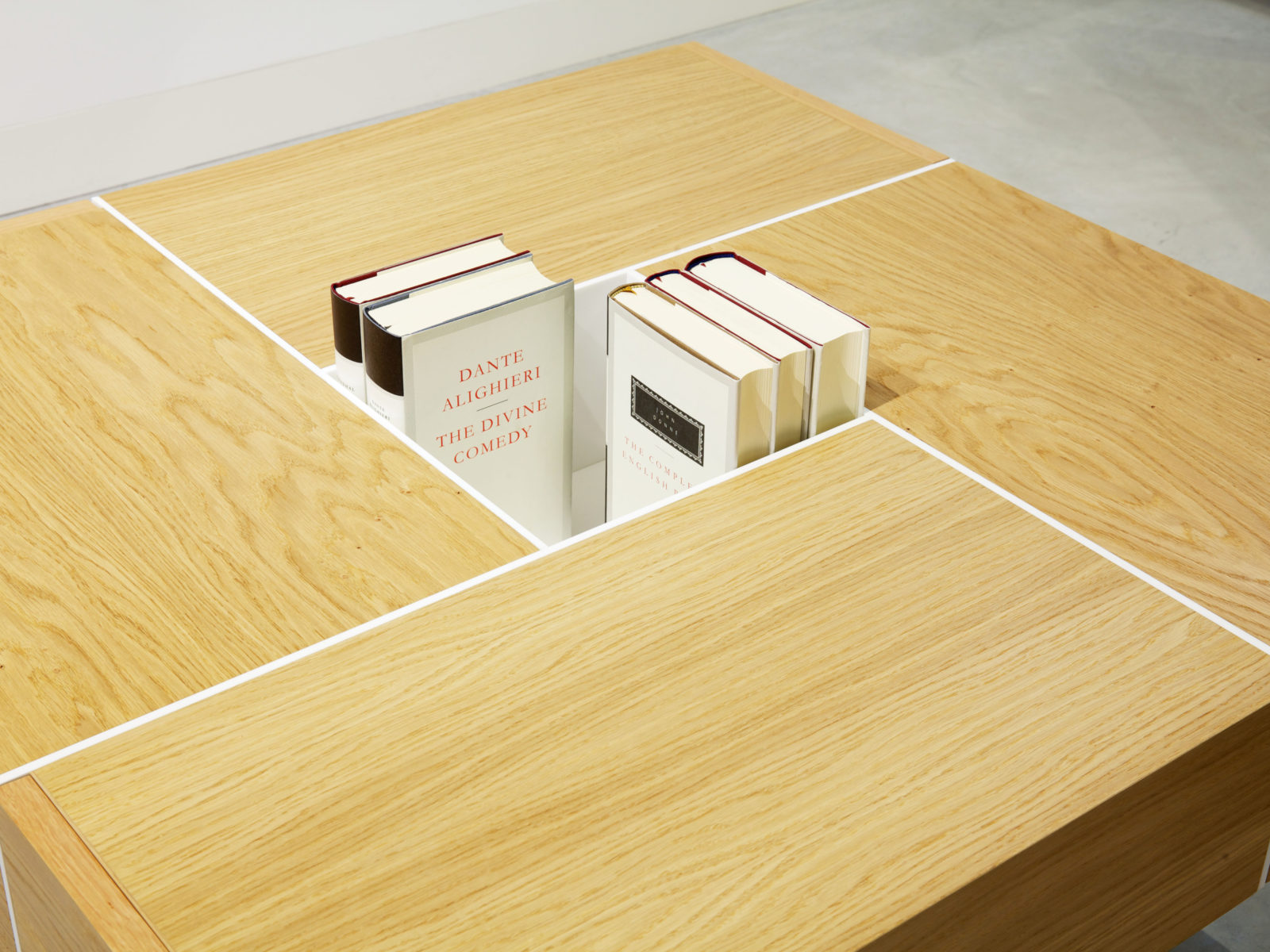 Oak veneer coffee table with white Corian inlay