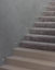 staircase with polished plaster walls