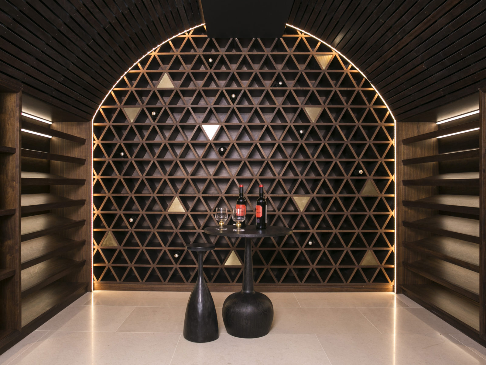 Solid walnut and satin brass bespoke wine cellar